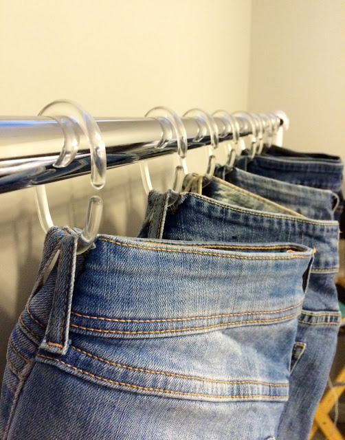 Hang your jeans on shower hooks to make them more accessible.