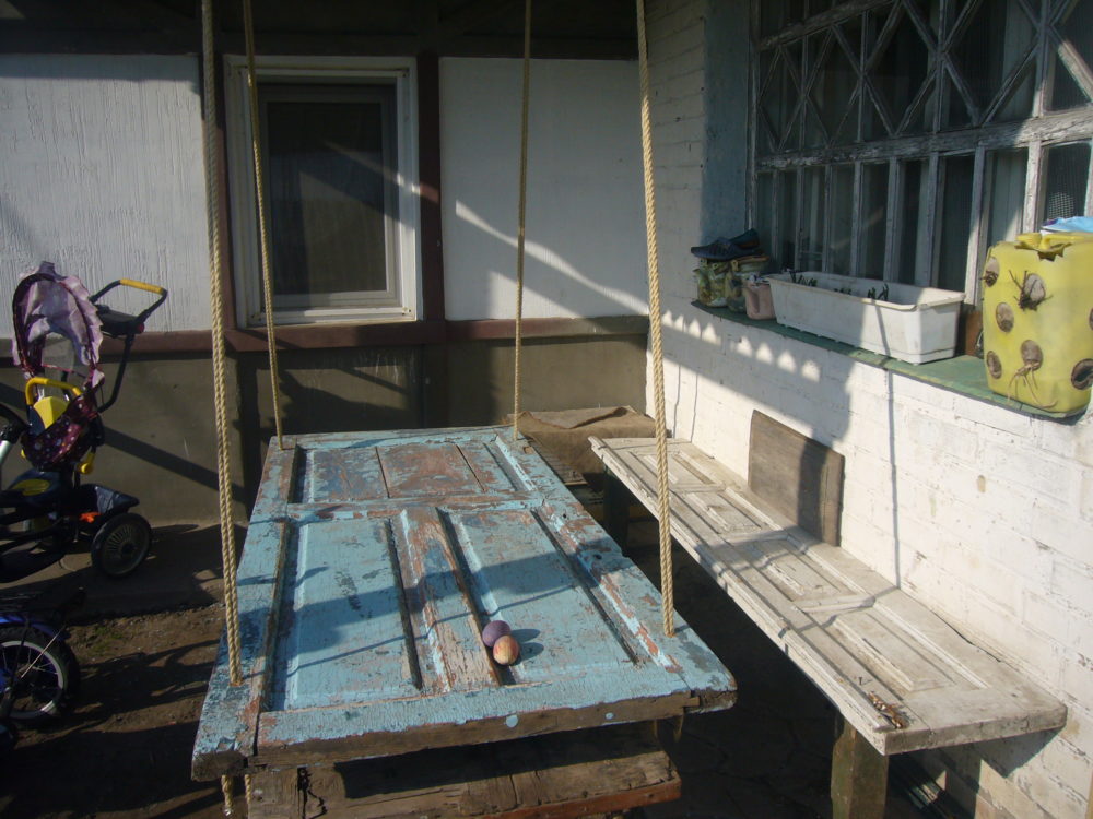 Turn Old Door Into Hanging Patio Table