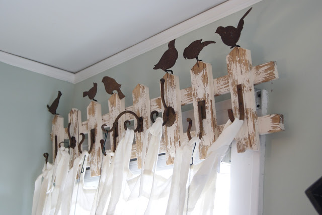 old fence with hooks as curtain rod