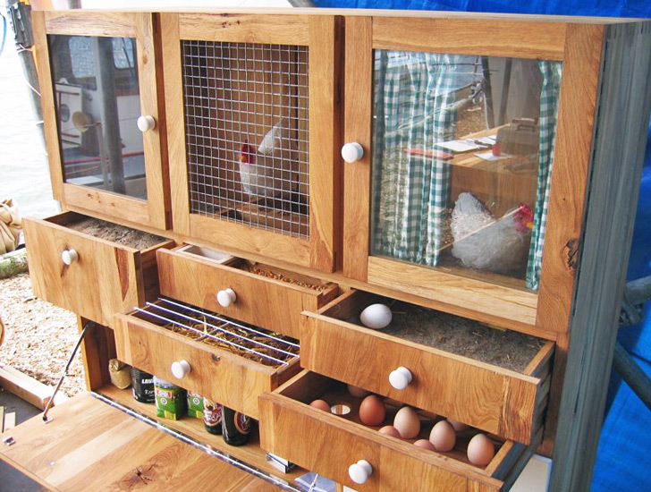 chicken coop made out of  an old cabinet