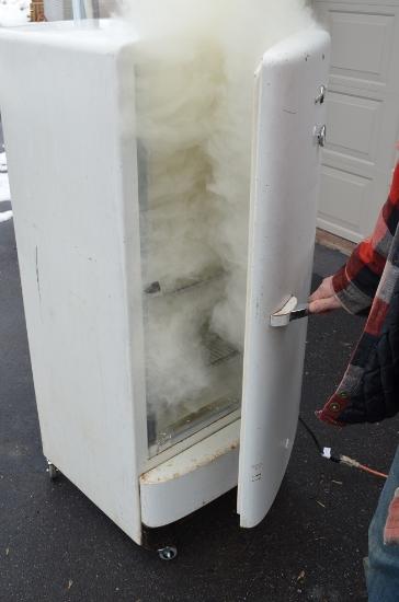 Make a meat smoker out of a fridge