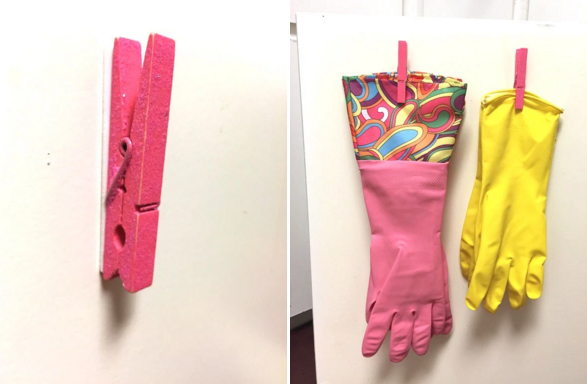 Stick a clothespin to the inside of the kitchen cabinet door to hold your cleaning gloves